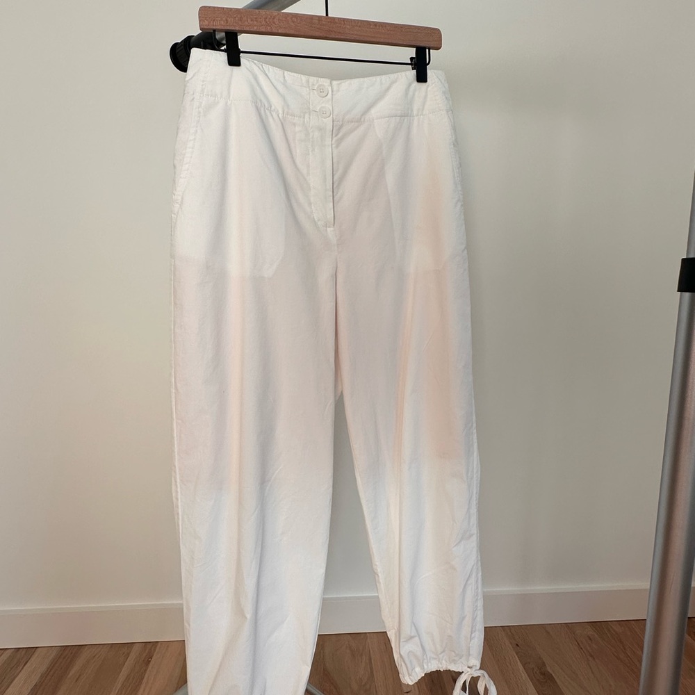 Rebecca Taylor white joggers, lined upper for no-show wear.